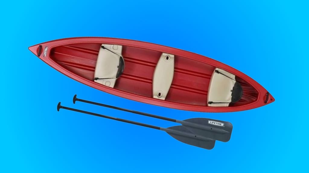 red 13 foot lifetime canoe with paddles